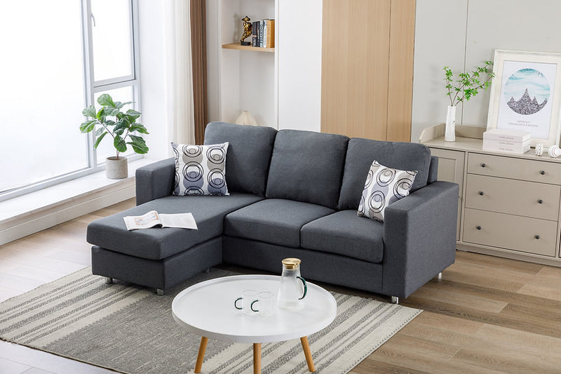 Grey Fabric Sofa With Chrome Legs and Accent Pillows