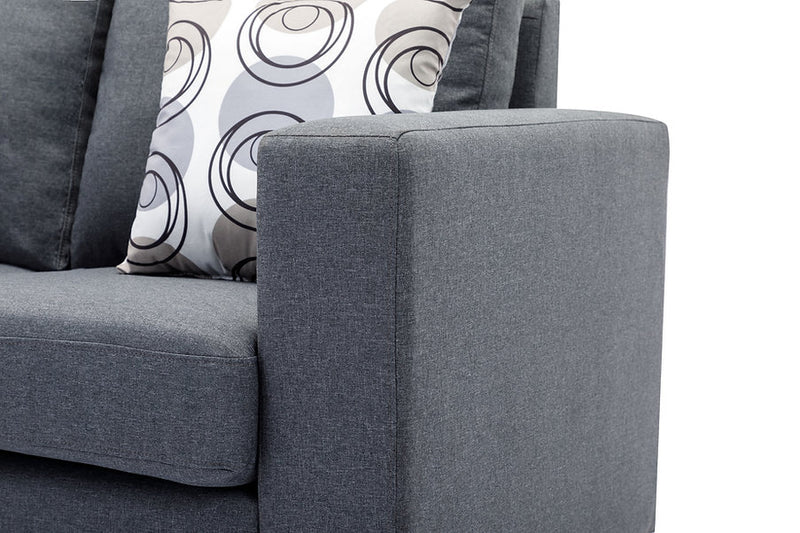 Grey Fabric Sofa With Chrome Legs and Accent Pillows