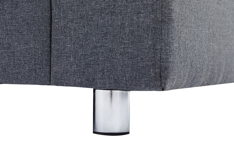 Grey Fabric Sofa With Chrome Legs and Accent Pillows